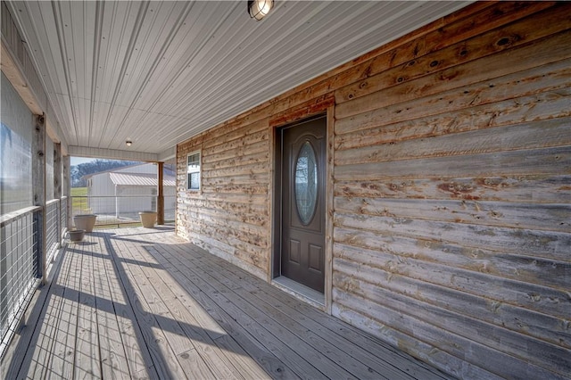 wooden deck featuring a porch