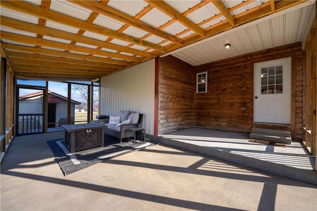 sunroom / solarium with lofted ceiling