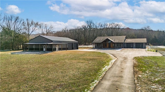 view of front of home with a front lawn