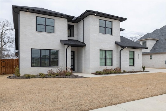 view of front of house with a front lawn