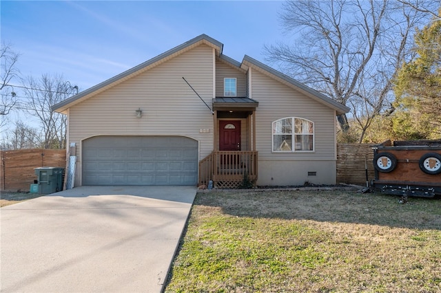 view of front of house featuring a garage and a front lawn