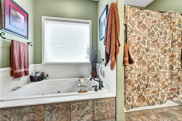 full bath with tile patterned flooring, curtained shower, and a whirlpool tub