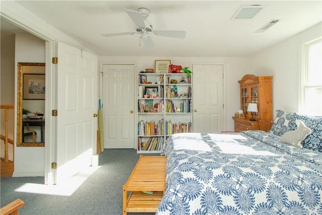 bedroom with dark carpet and ceiling fan