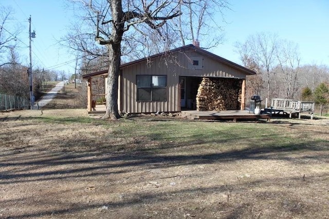 view of home's exterior featuring a deck