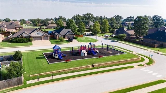 view of property's community with a playground