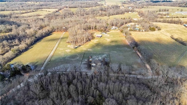 birds eye view of property featuring a rural view