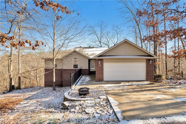 single story home with a garage