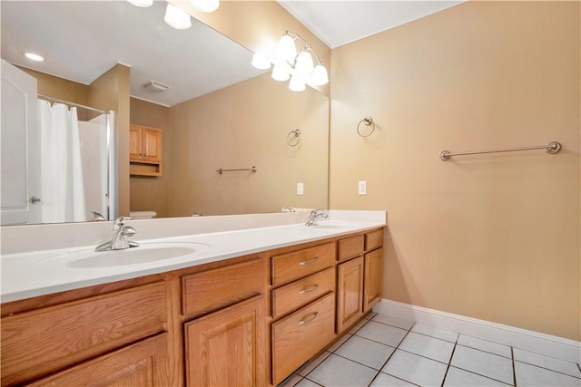 bathroom featuring tile patterned flooring, vanity, toilet, and a shower with shower curtain