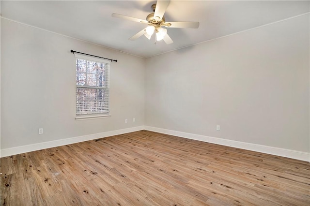 unfurnished room featuring ceiling fan and light hardwood / wood-style floors