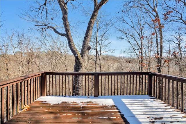 view of snow covered deck