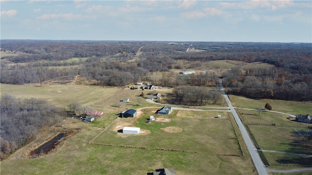 birds eye view of property featuring a rural view