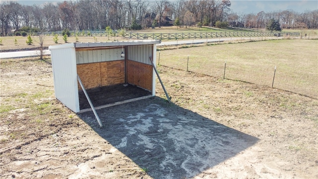 exterior space with a rural view