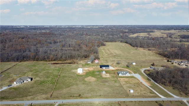 birds eye view of property featuring a rural view