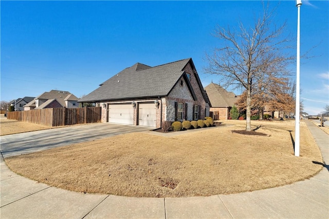 view of side of home featuring a garage