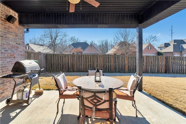 view of patio featuring a grill