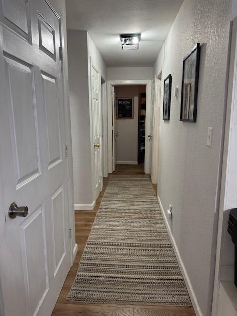 hall featuring hardwood / wood-style floors