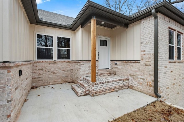 doorway to property featuring a patio