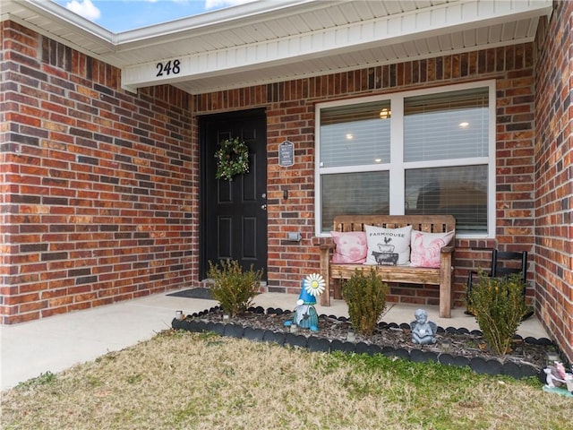 property entrance featuring covered porch