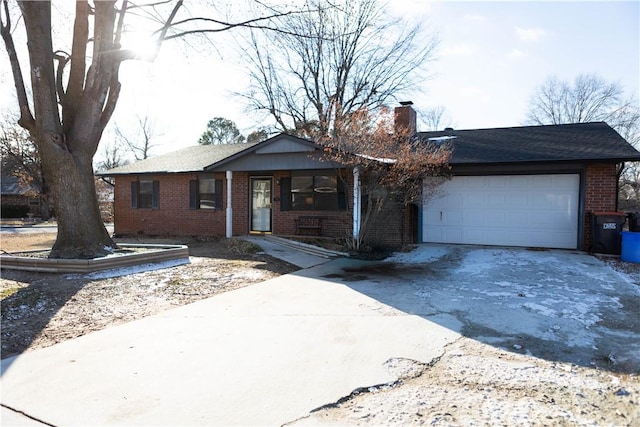 ranch-style home featuring a garage