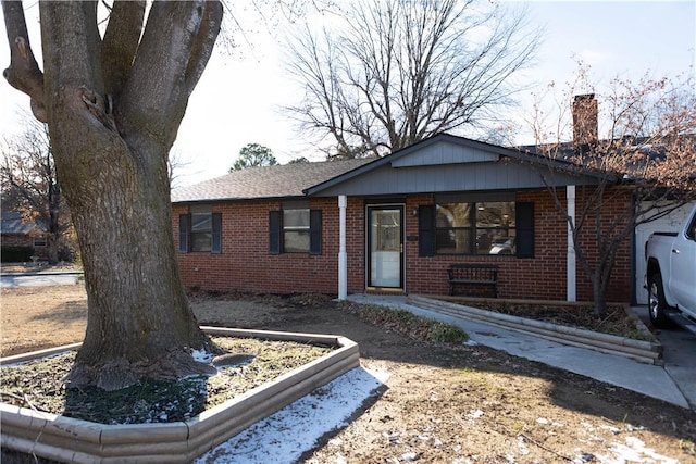 ranch-style home with covered porch