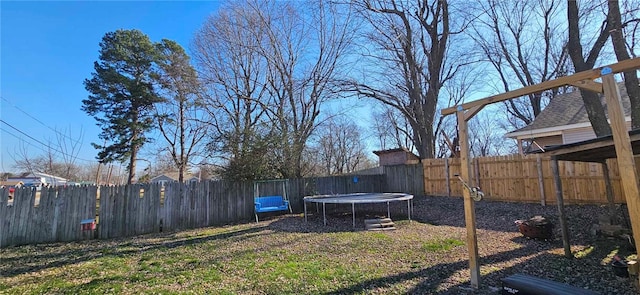 view of yard with a trampoline