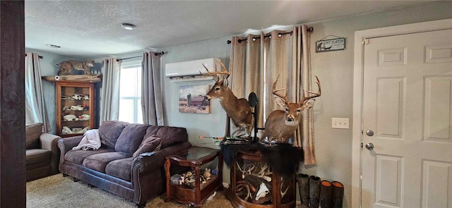 living room featuring a wall mounted air conditioner, carpet floors, and a textured ceiling