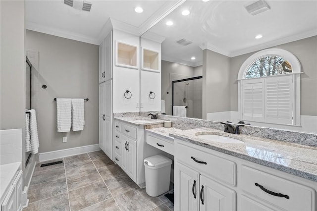 bathroom with vanity, ornamental molding, and walk in shower