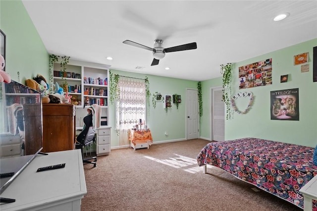 carpeted bedroom featuring ceiling fan