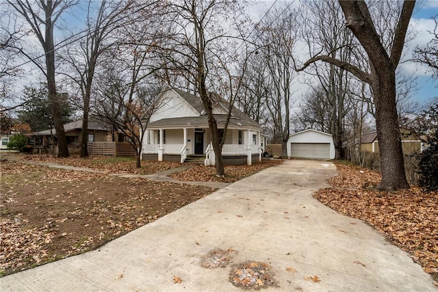 view of front of house with a porch, an outdoor structure, and a garage