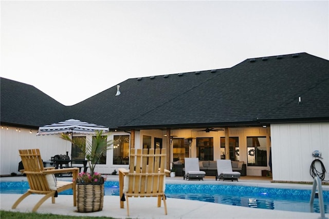 view of swimming pool with a patio area