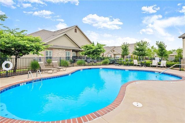 view of pool featuring a patio