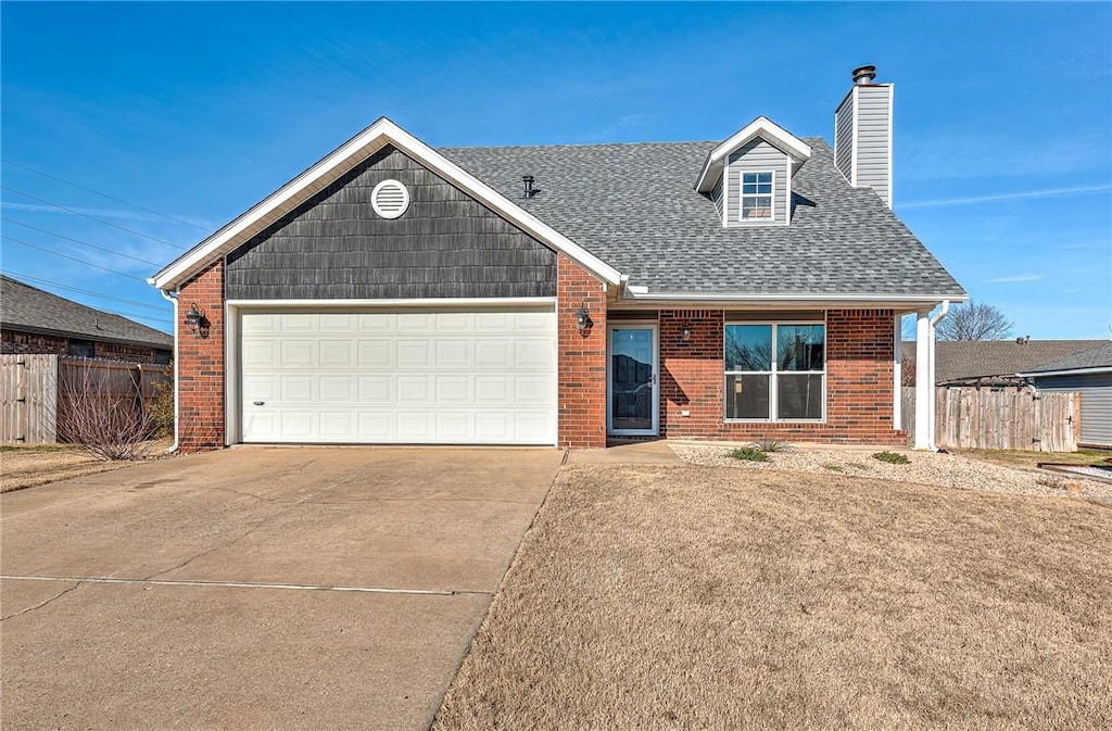 view of front of property with a garage