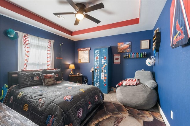 carpeted bedroom with ceiling fan