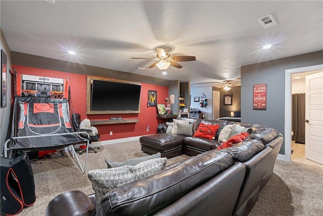 living room featuring ceiling fan and light carpet