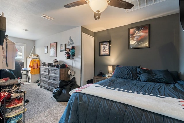 carpeted bedroom featuring ceiling fan