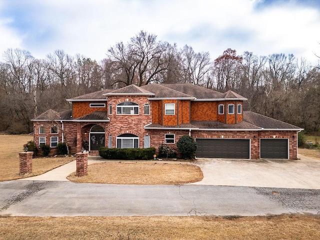 view of front of property with a garage