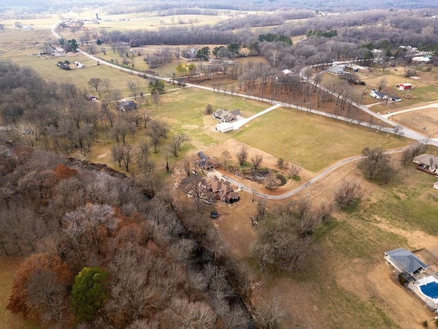 birds eye view of property featuring a rural view