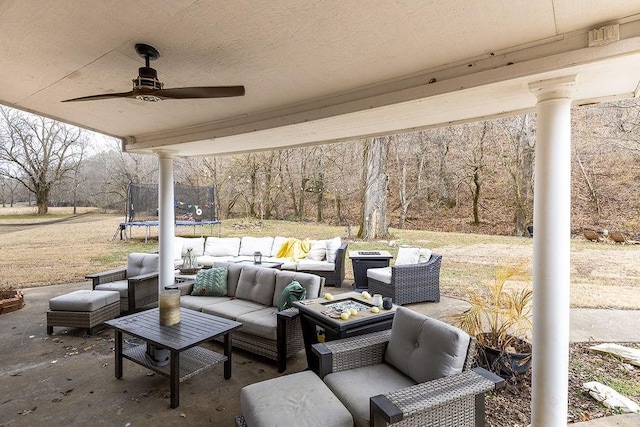 view of patio with an outdoor hangout area, a trampoline, and ceiling fan