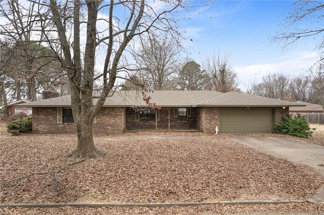 single story home featuring a garage