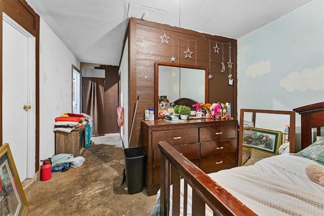 bedroom with concrete flooring