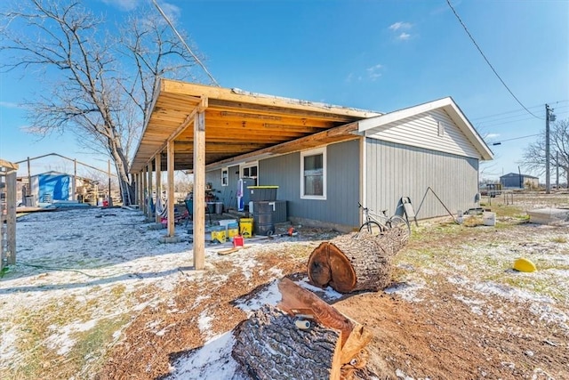 back of house with cooling unit