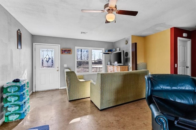 living room featuring ceiling fan