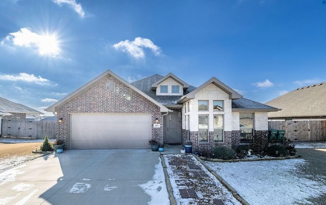 view of front of property with a garage