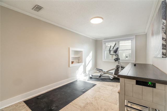 exercise room featuring a textured ceiling and ornamental molding