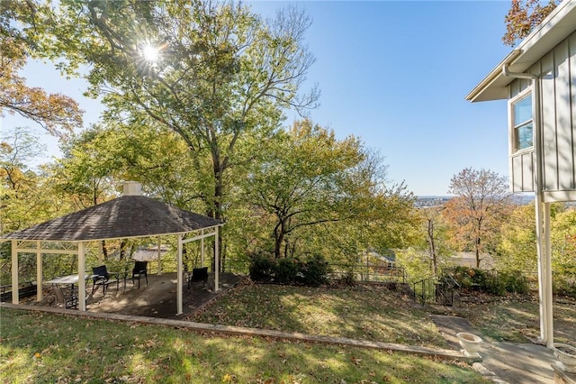 view of yard featuring a gazebo and a patio