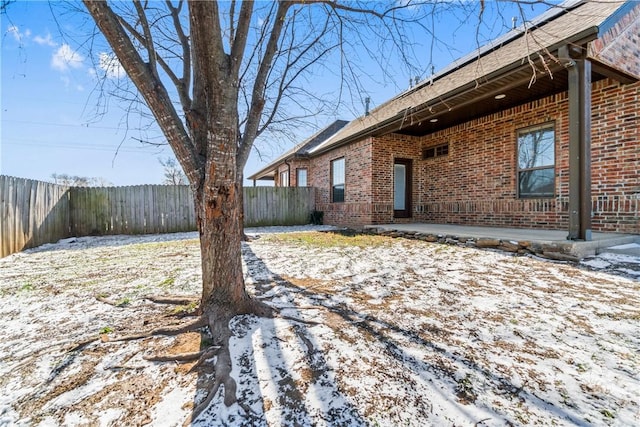 view of yard covered in snow