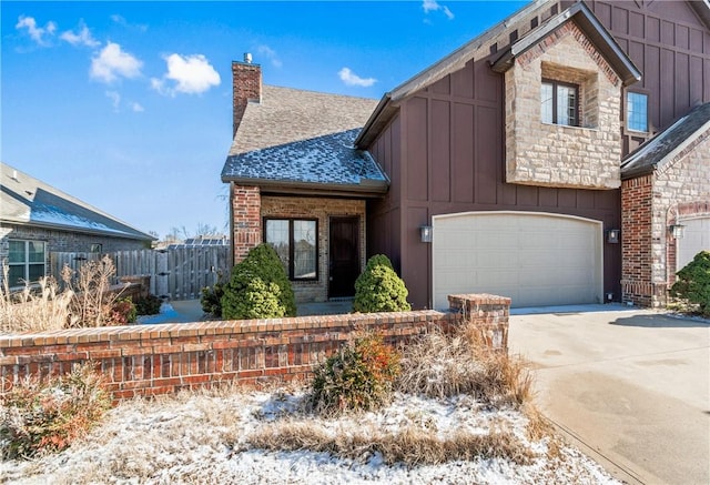 front facade with a garage