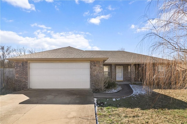 ranch-style house featuring a garage