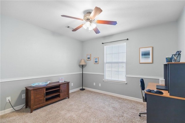 home office with ceiling fan and light colored carpet