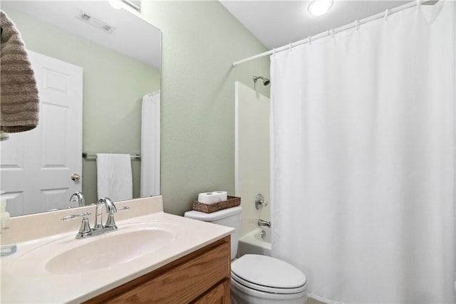 full bathroom featuring shower / bath combination with curtain, vanity, and toilet